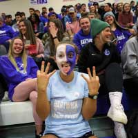 students with painted faces