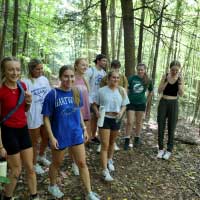 students walk in forest