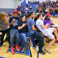 students playing musical chairs