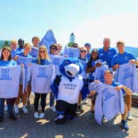 mascot and students with Hartwick sweatshirts