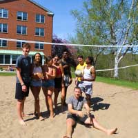 students playing volleyball